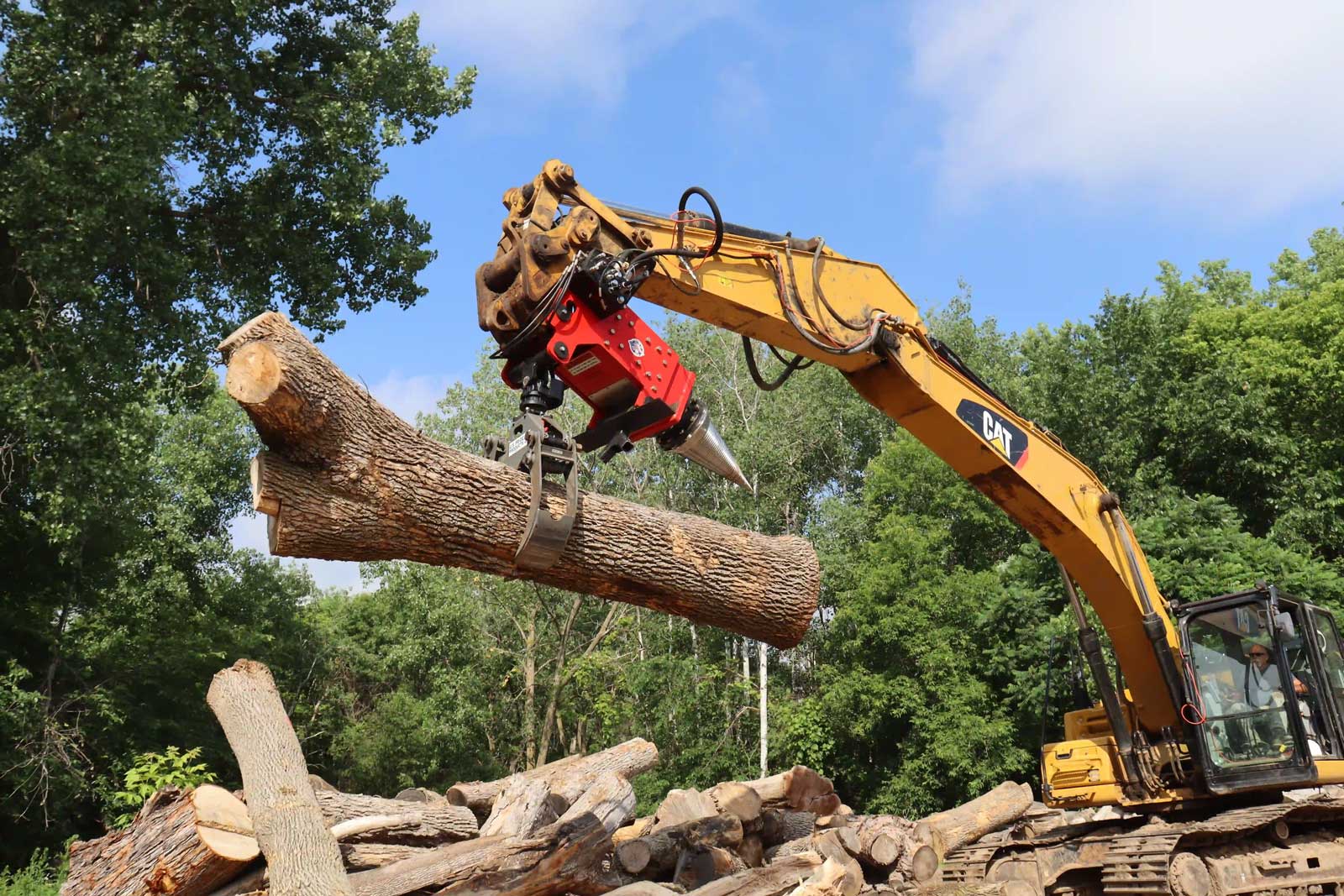 HF-800 with Grapple lifting log